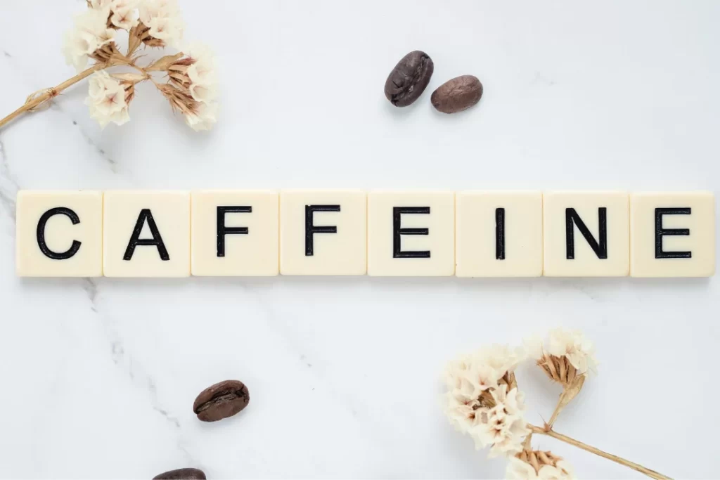 caffeine written with wooden blocks