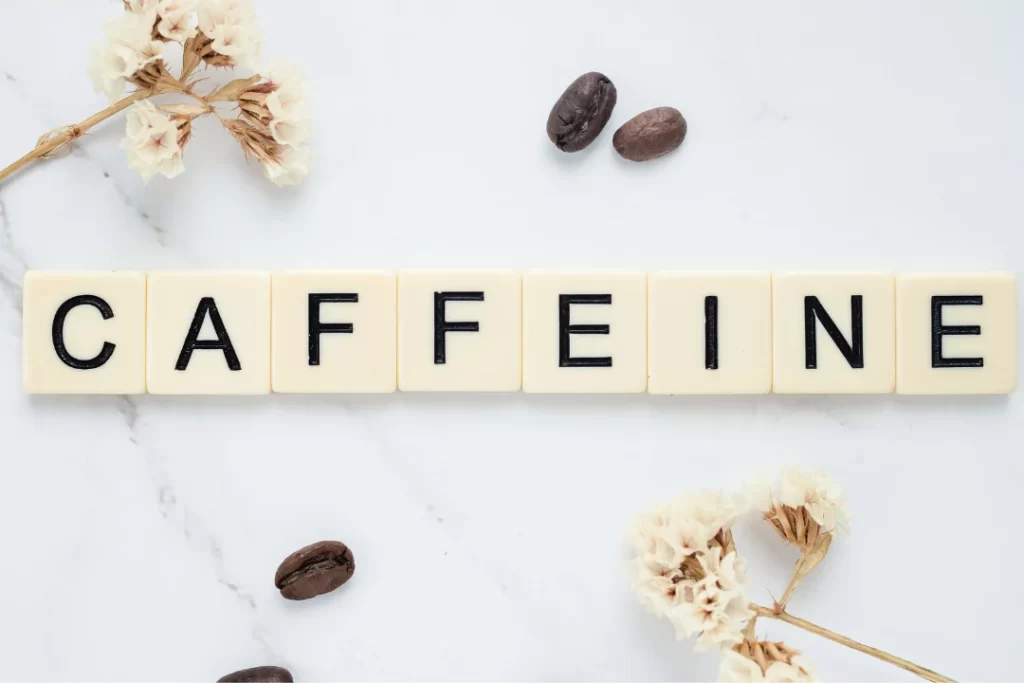 caffeine written with wooden blocks 