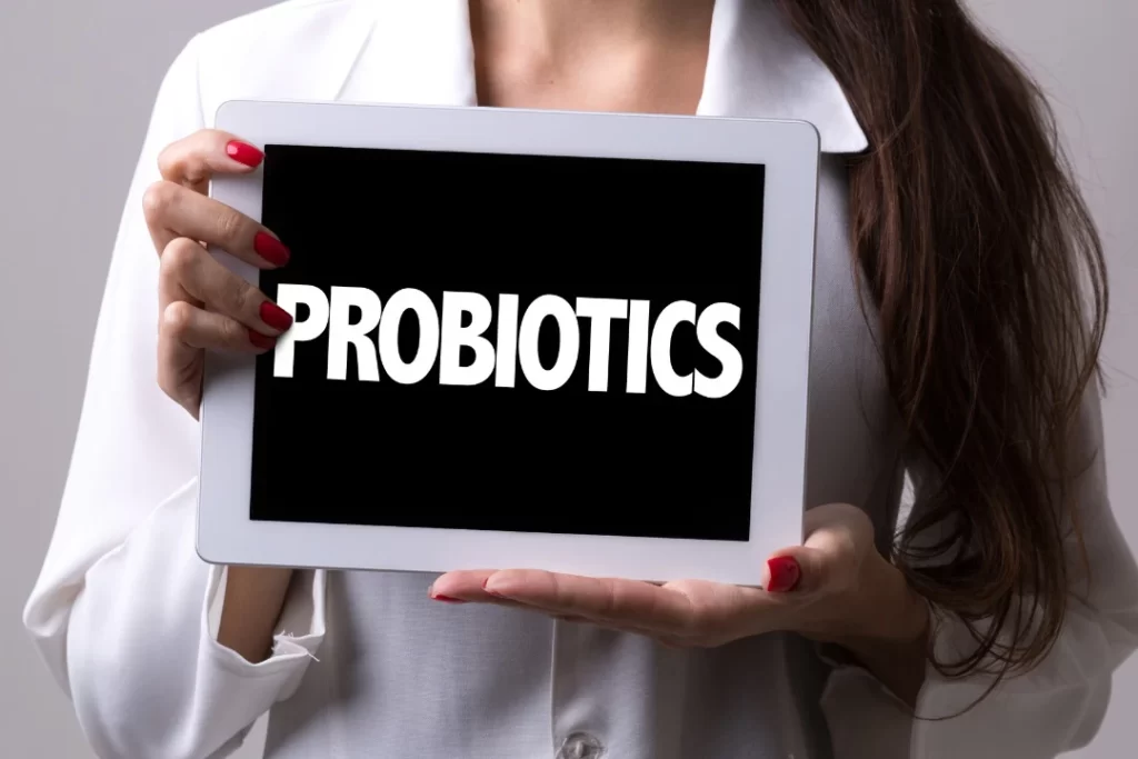 Probiotics wallpaper sets on Ipad in the woman's hand. 