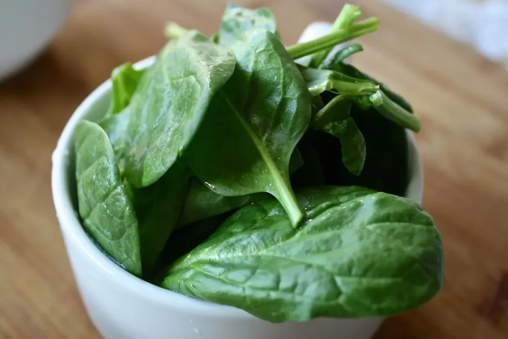 spinach leaves in a bowl superfoods for energy