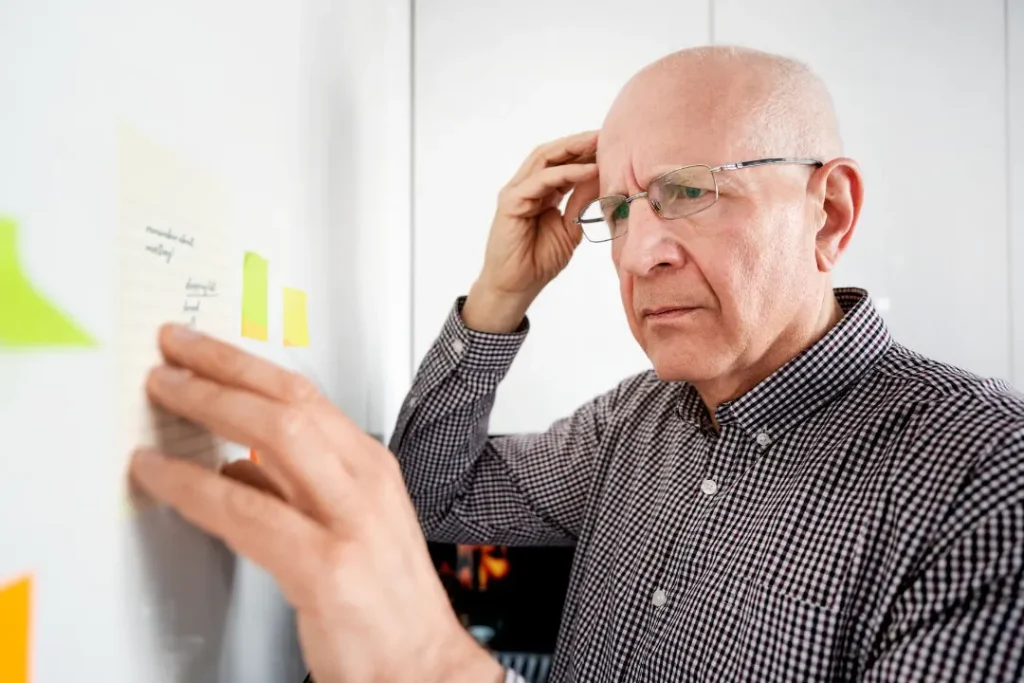 An old man looking confused.
